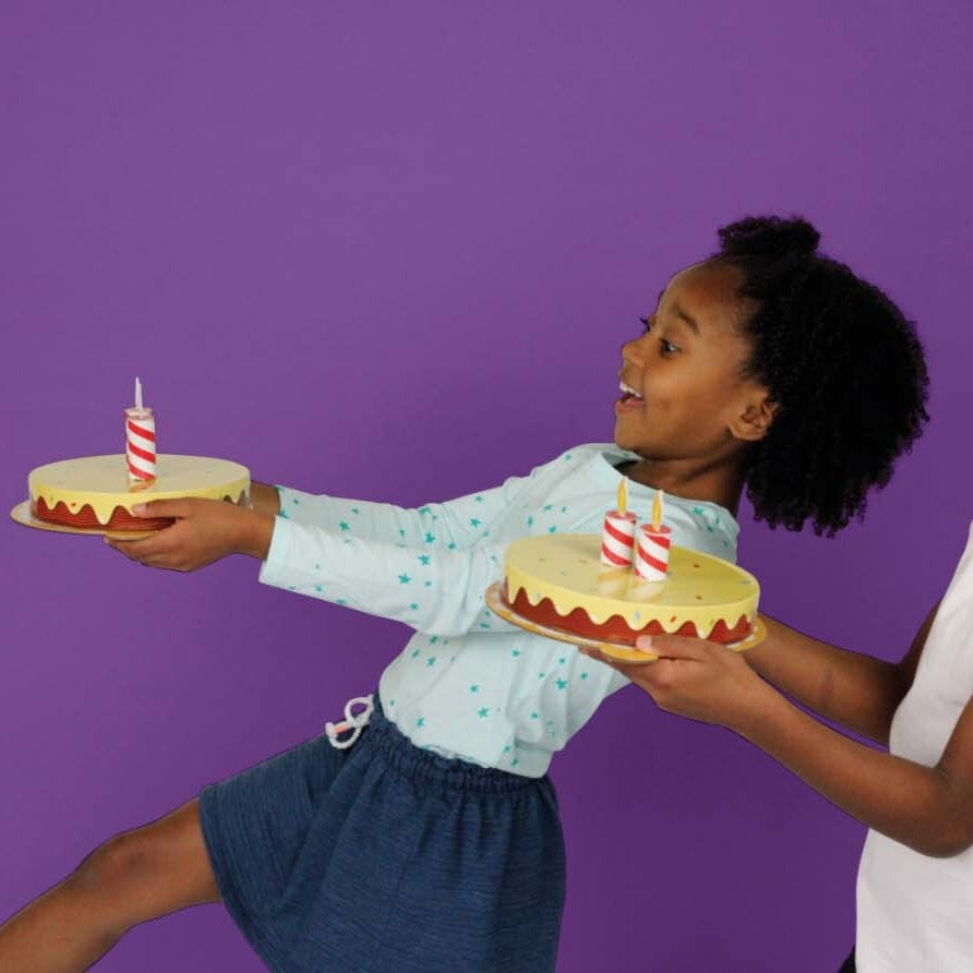 Children playing Cake Race game