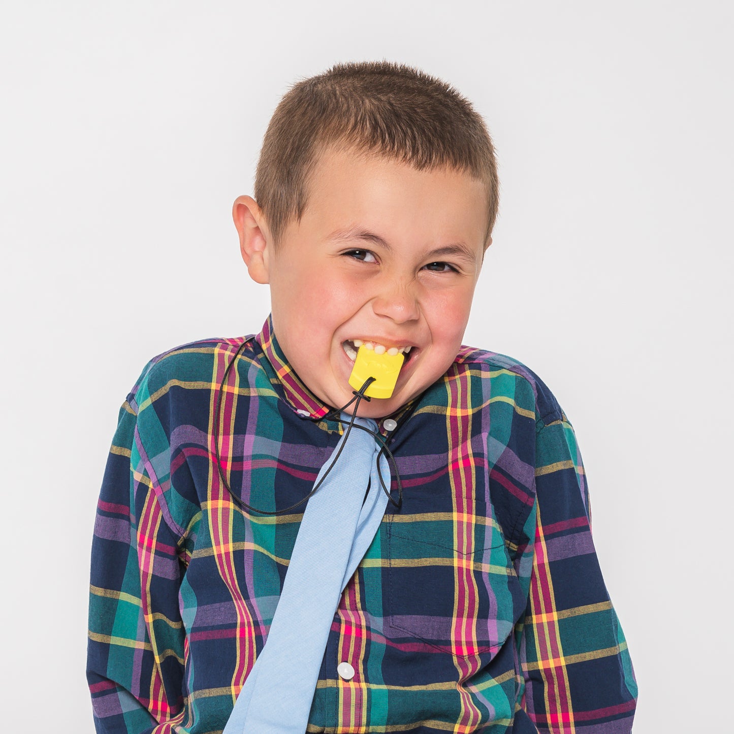 Boy chewing ARK Bat Bite Sensory Chew Necklace