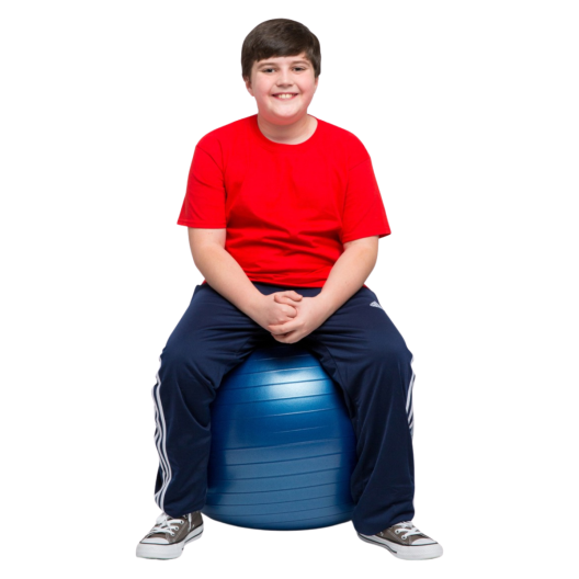 Boy sitting on exercise ball blue