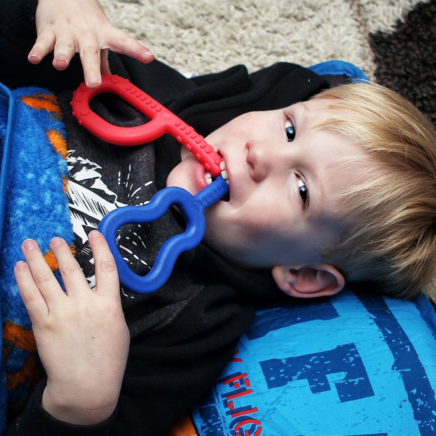 Boy Chewing ARK Guitar Chew