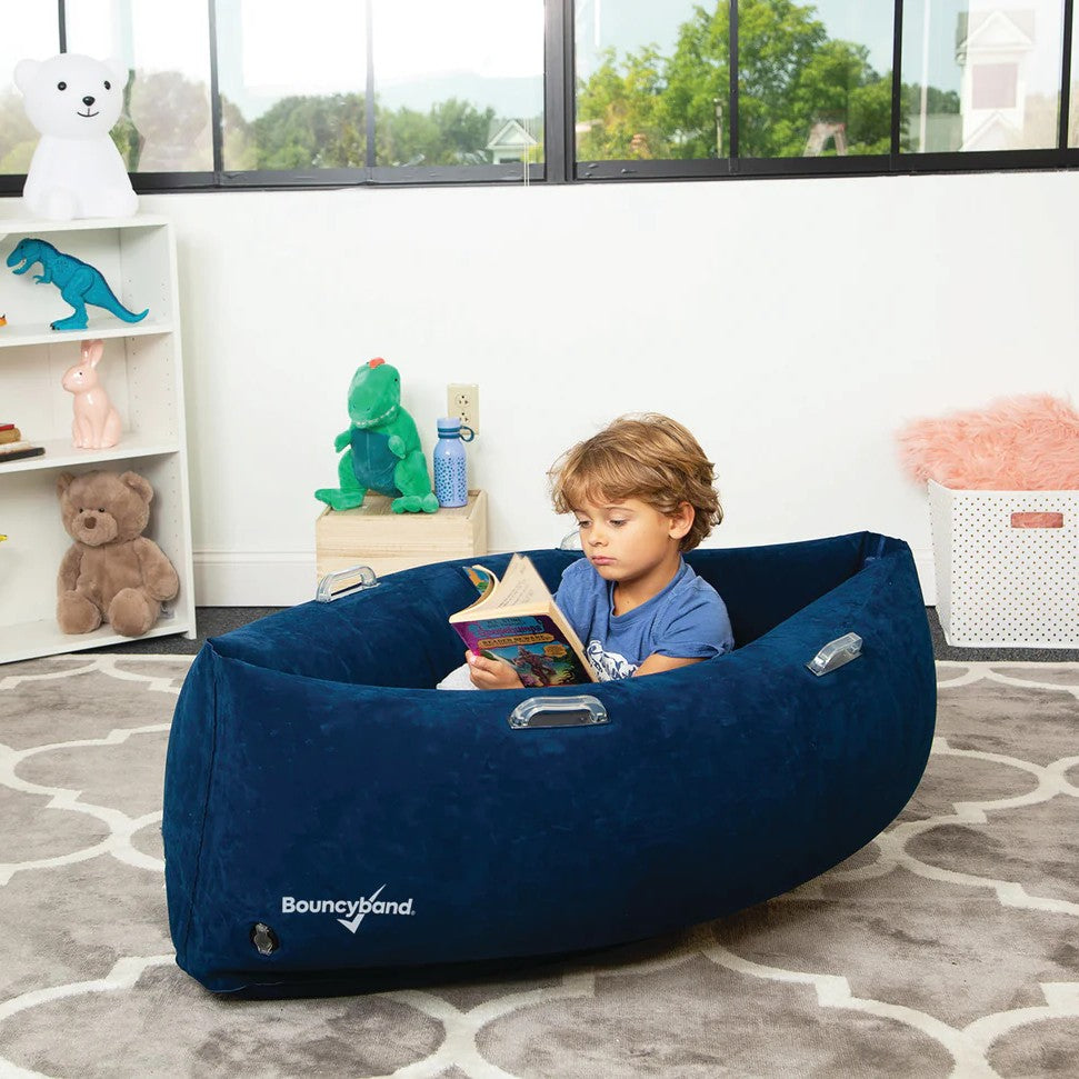 Boy reading in Playlearn Peapod Small 20cm