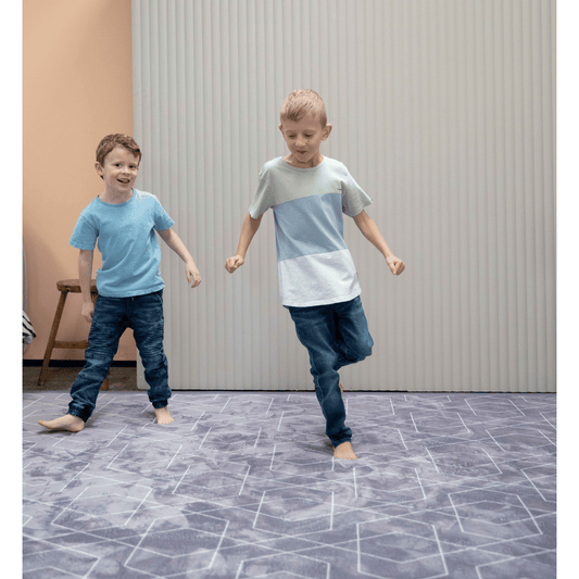 Boys running on Mooshy Mat Geo Grey
