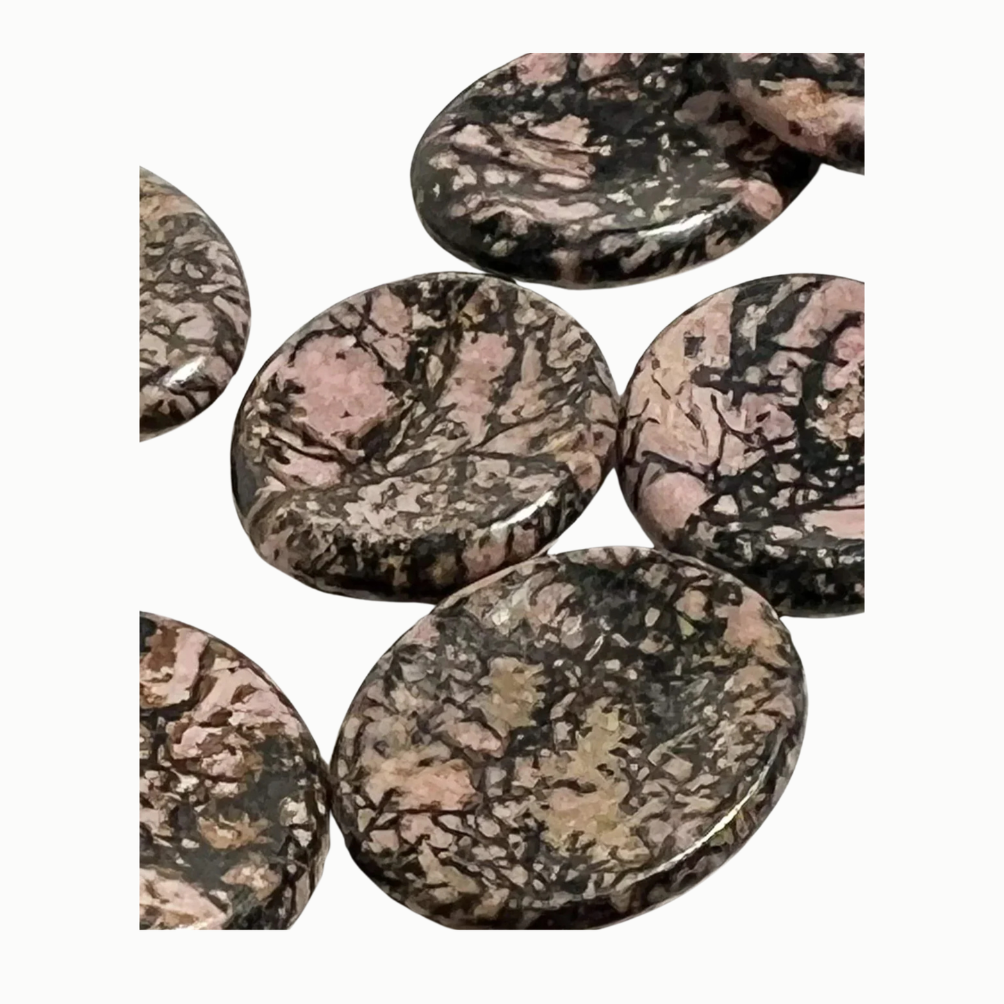 pink and black web like pattern worry stones