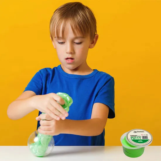 Boy playing with therapy putty