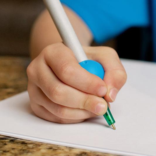 Child using Butter Pencil Grip
