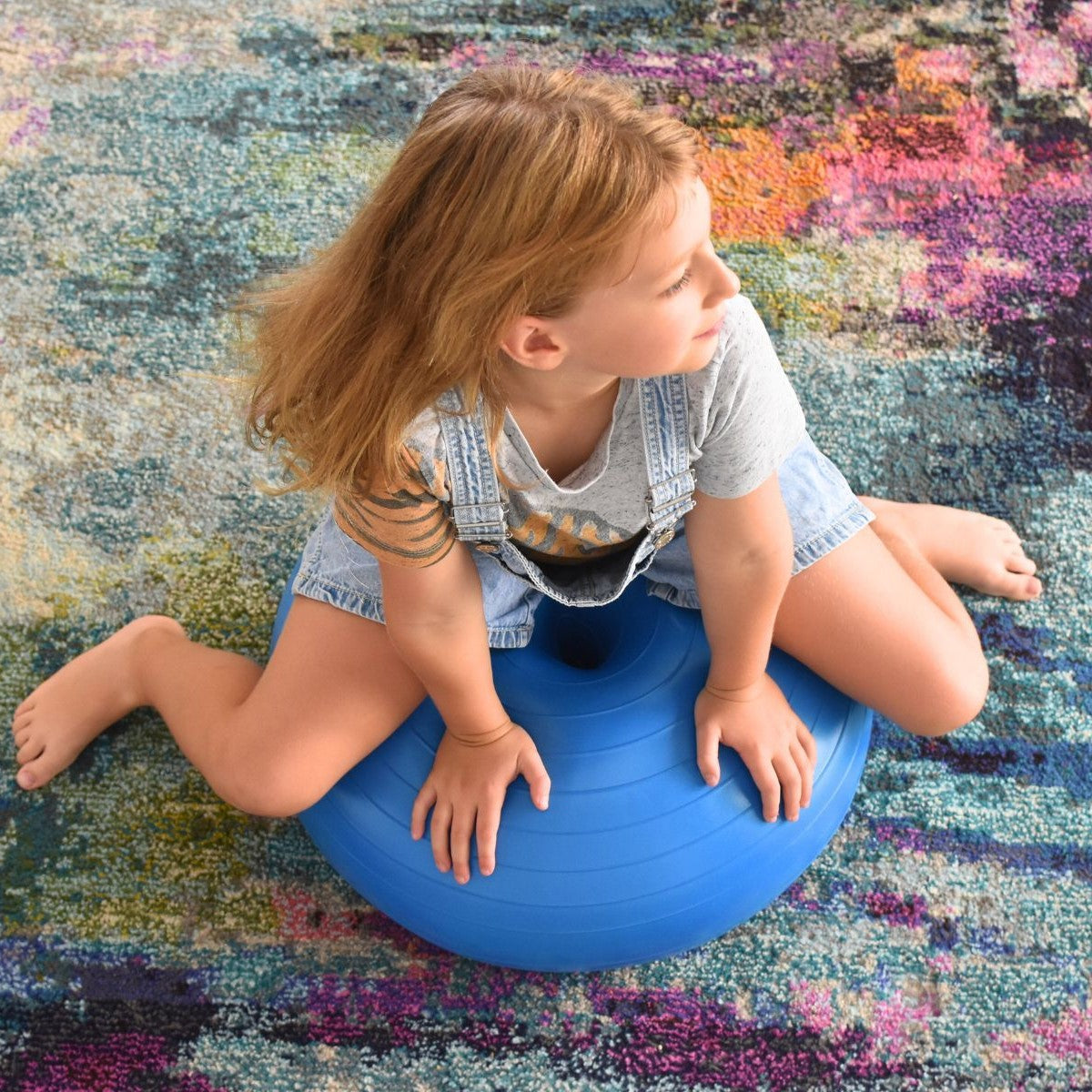 Girl on Donut therapy ball