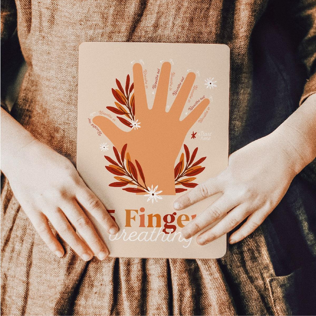 Girl holding Calm Down Cards