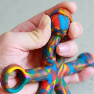 Hand holding Chewigem Hexigem Sensory Chew