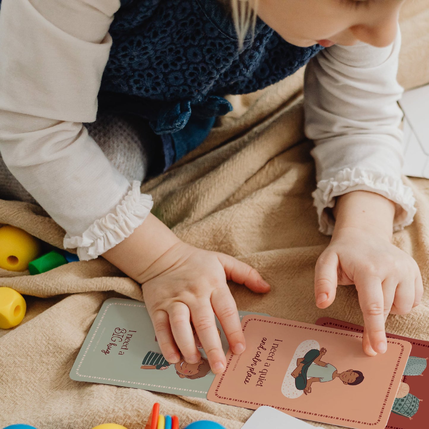 child looking at Creative Sprout Communication Cards
