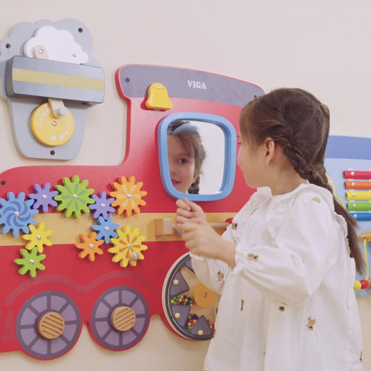 Viga Wall Activity Panel Train Girl looking in mirror