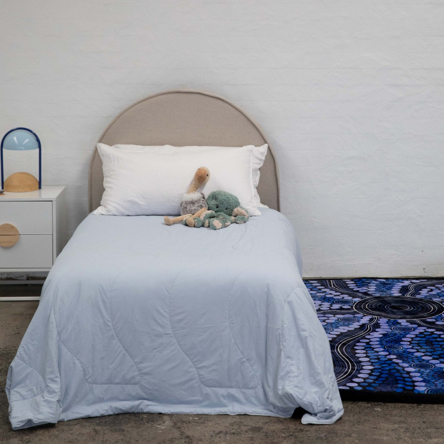 The Sensory Specialist Cooling Blanket on bed