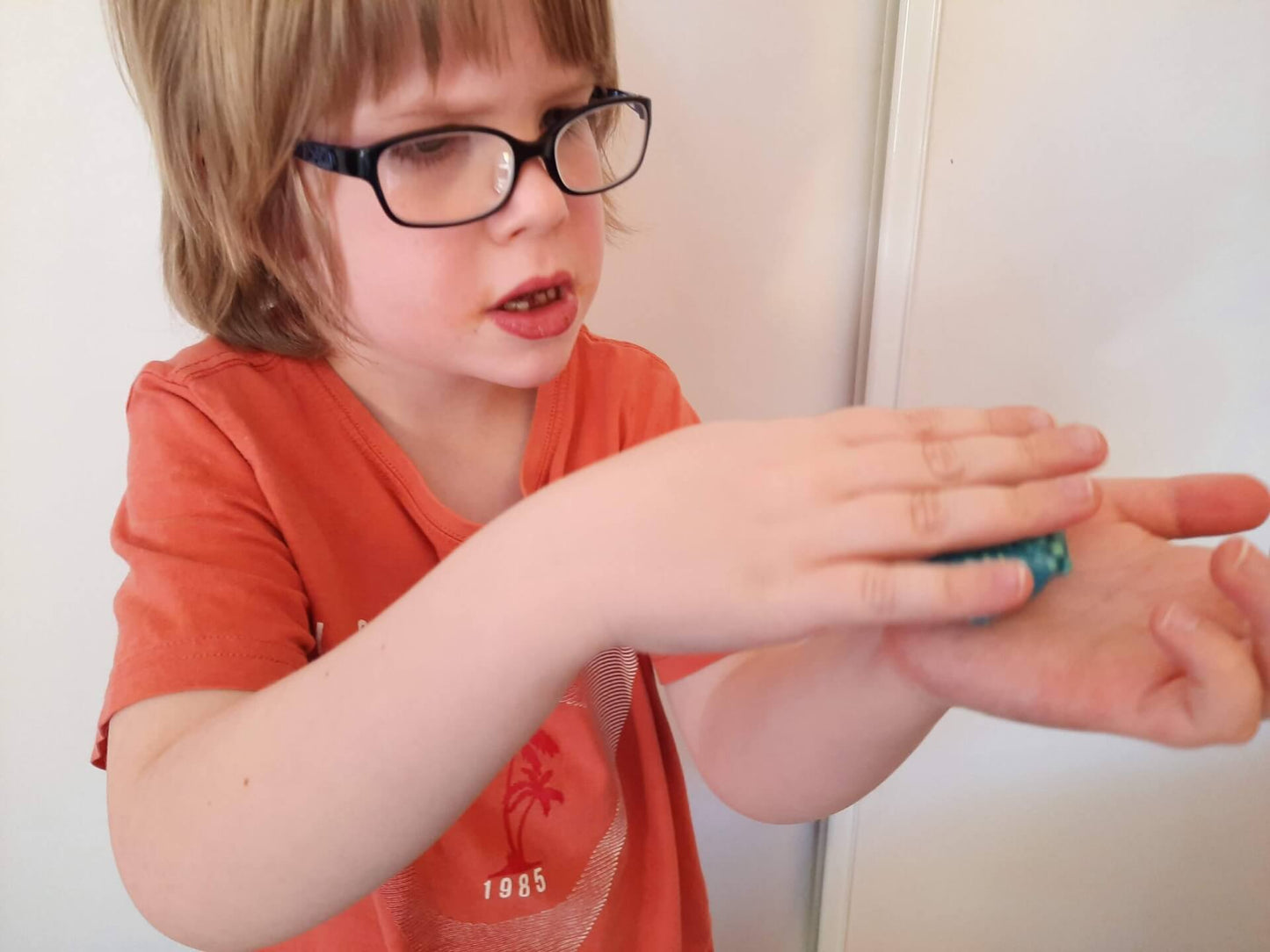 Boy with crunchy putty roll