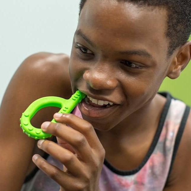 Boy with Ark Therapeutics Textured Grabber