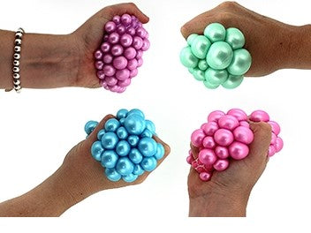 Pearl Mesh Squishy Ball in hand