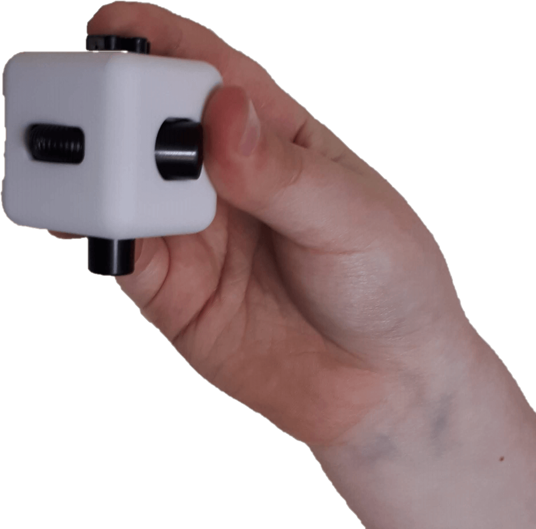 boy holding fidget cube
