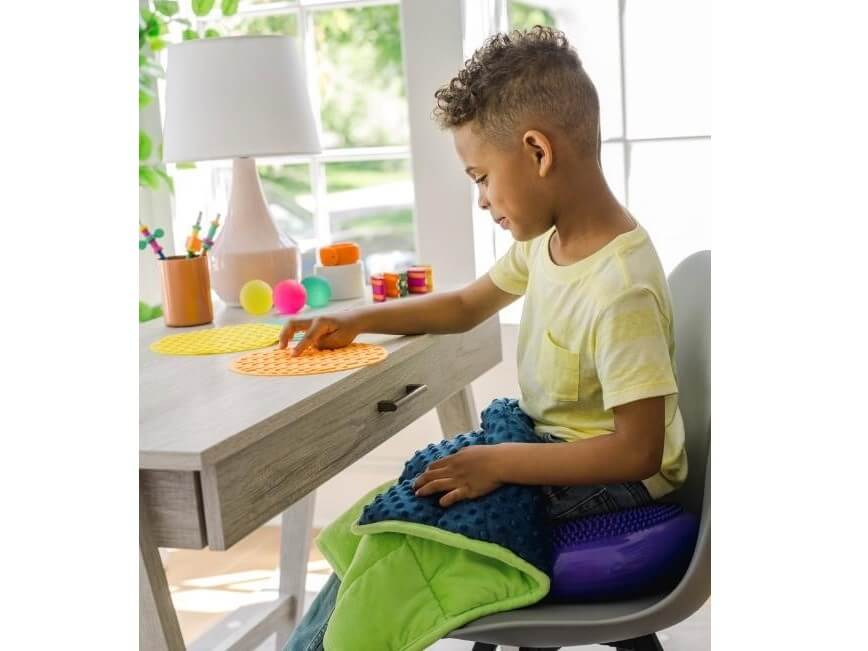 Weighted blanket and Sensory Mats with boy
