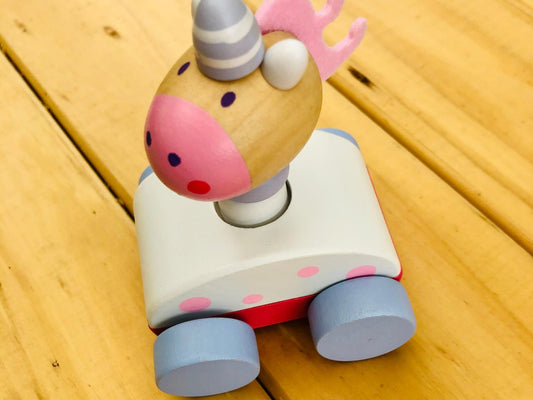 wooden unicorn white toy