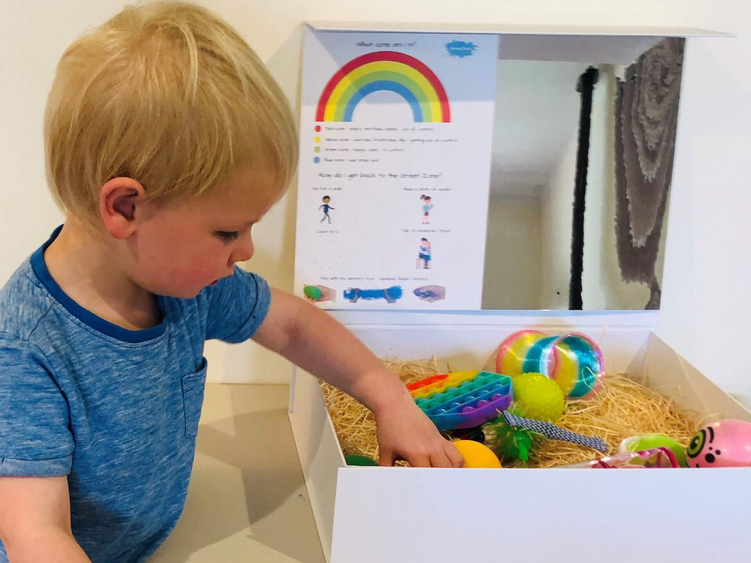 Patrick with sensory box (2)