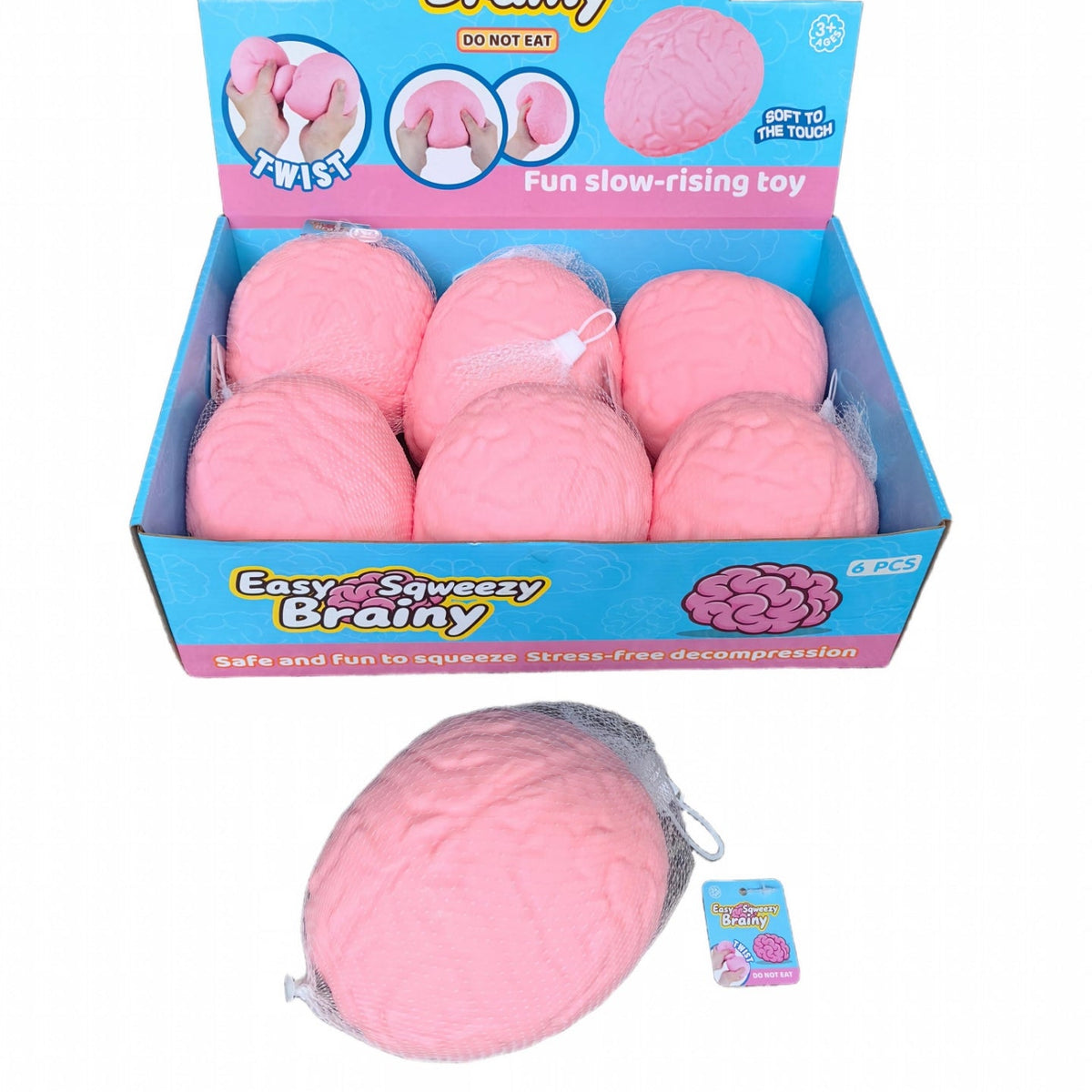 A retail display box filled with pink brain-shaped squishy toys, with one loose toy and a small tag shown in front on a white background. The packaging reads 'Easy Squeeezy Brainy'.