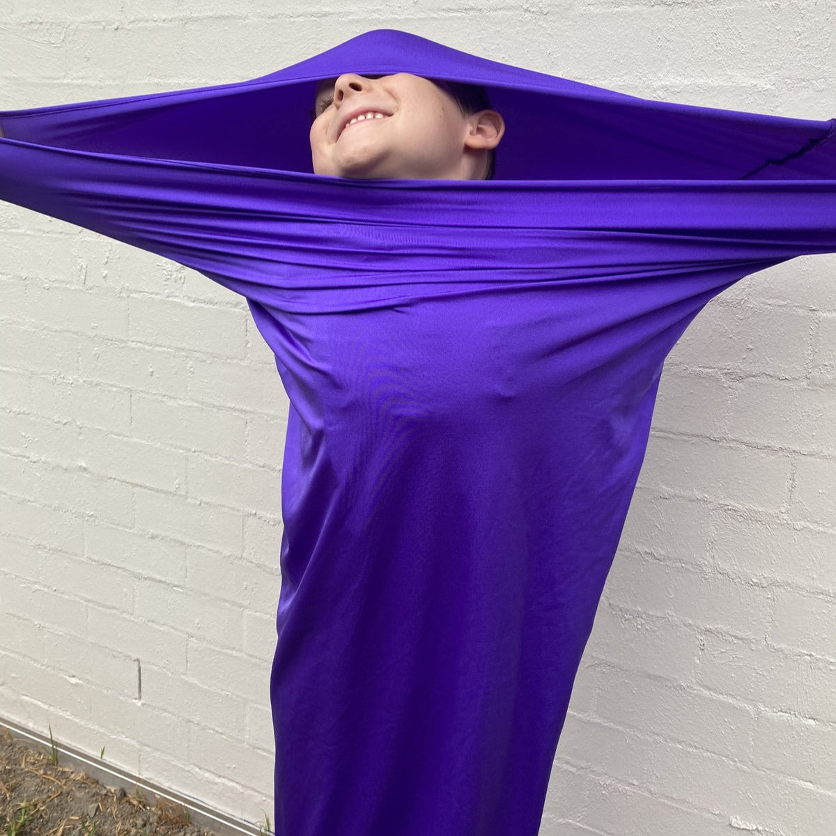 Boy using Lycra Movement Tube