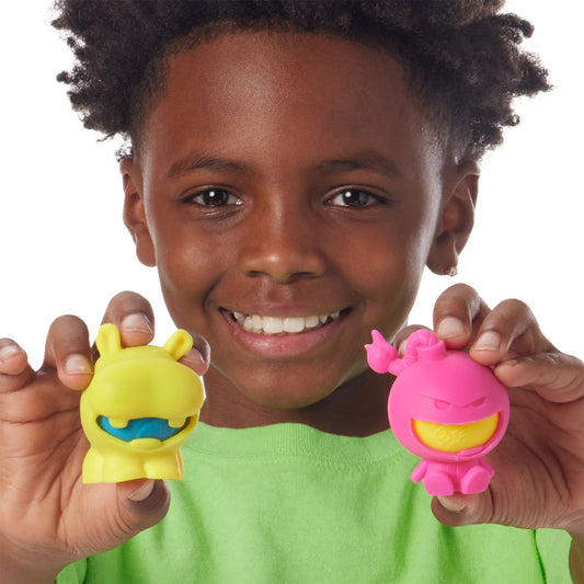 Boy holding Dohjee 3 Squishies