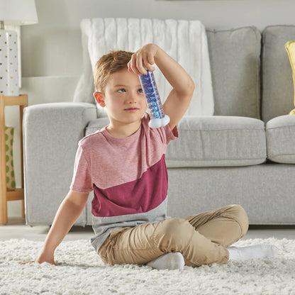 Boy using Sounds of Rain Sensory Tubes