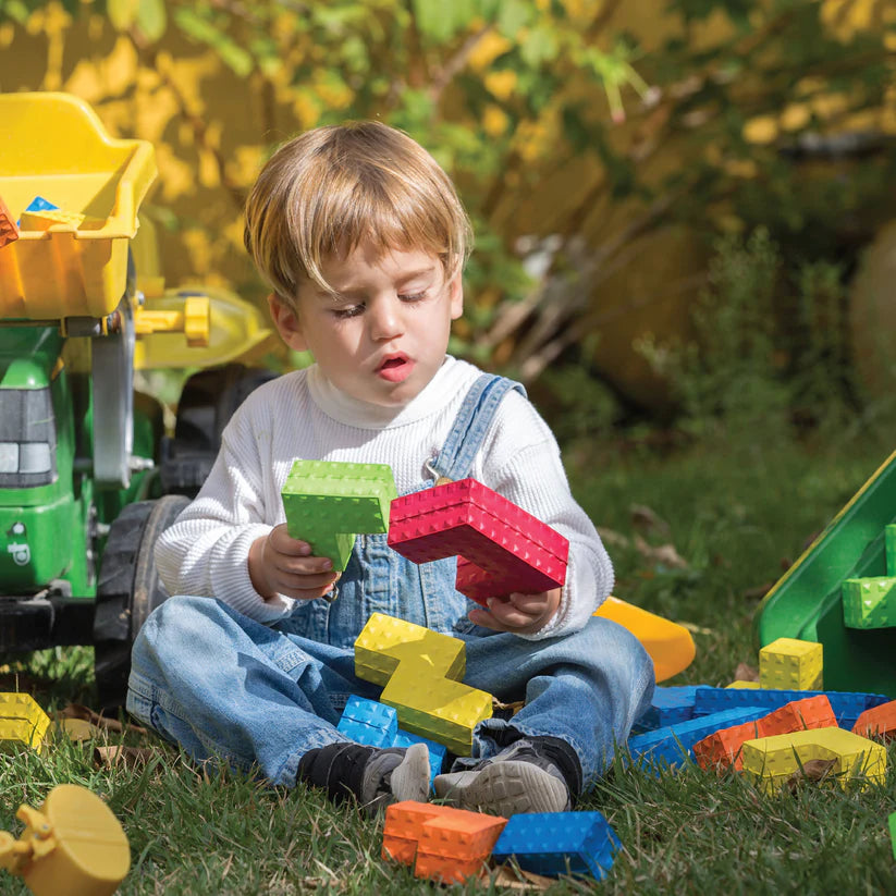 Boy Playing Sensory Puzzle Blocks