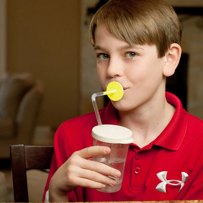 Boy using ARK Lip Blok Straw Mouthpiece