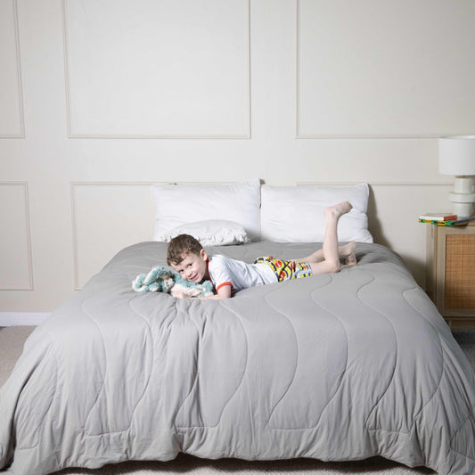 The Sensory Specialist Cooling Blanket on bed