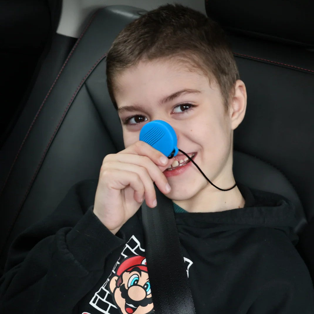 Boy holding Vibrant Hummingbird Pendant