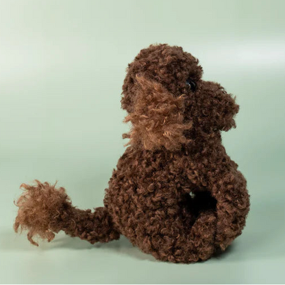 SNUGGLE-SNAP™ Raffy – Comfort That Travels With You Snap Band sitting