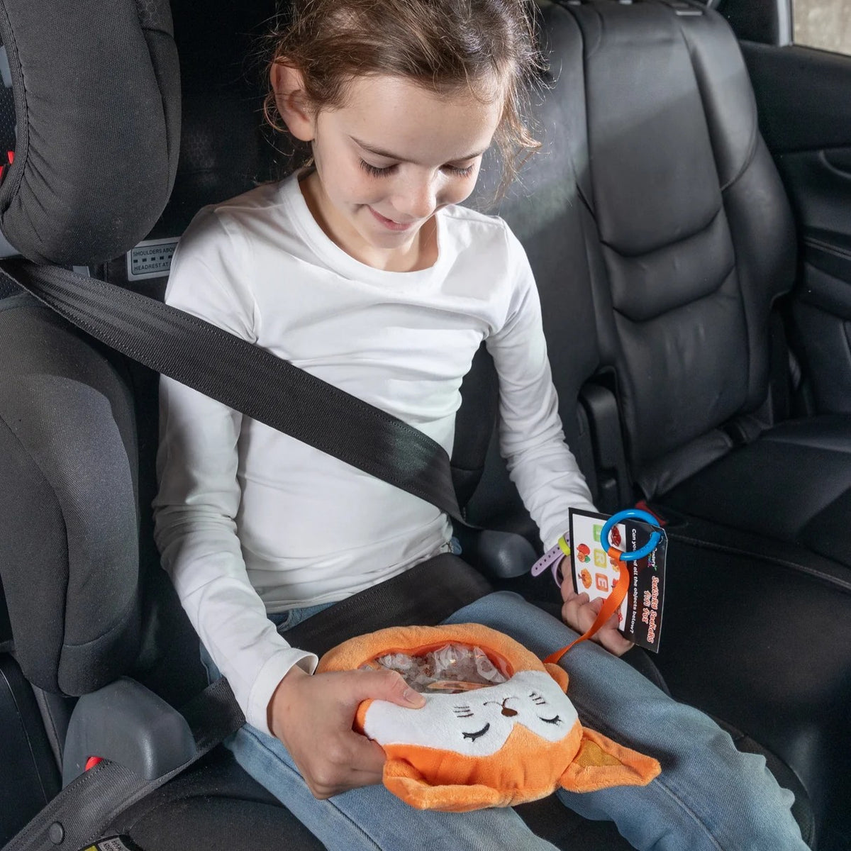 Sensory Seekers Interactive seek and find toy Girl in car