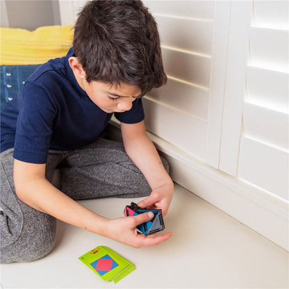 Boy using Ivans Hinge Brain teaser Puzzle