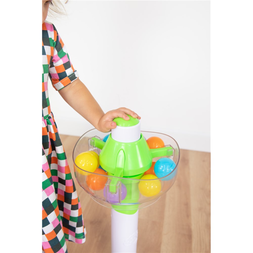 Child pressing Fat Brain Spill Again Ball Tower