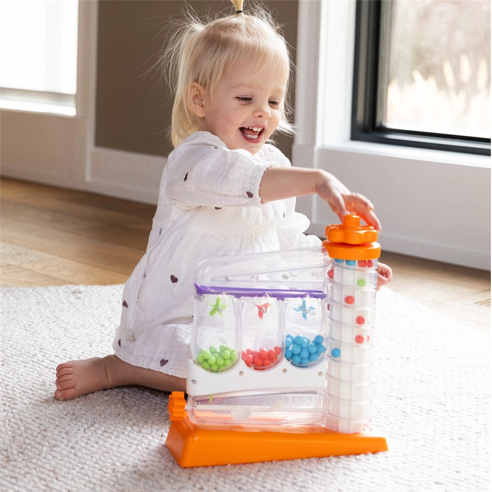 Girl playing Fat Brain Game Sort Again