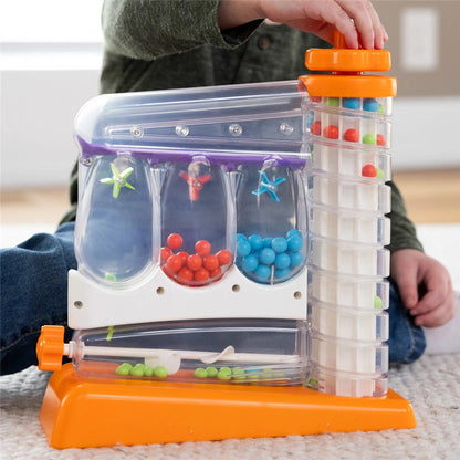Child playing Fat Brain Game Sort Again