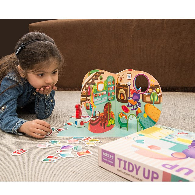 Girl playing Tidy up sort around the house game