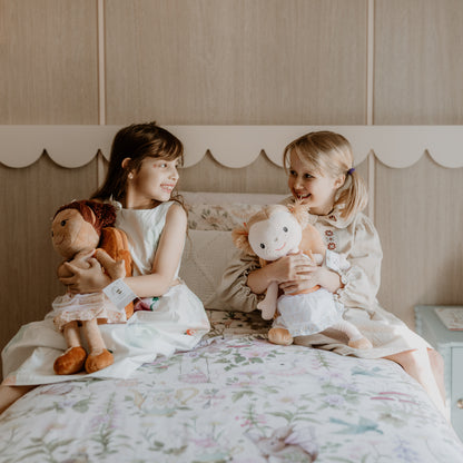 Girls sitting together with Affirmation Alice and Journal Jasmine