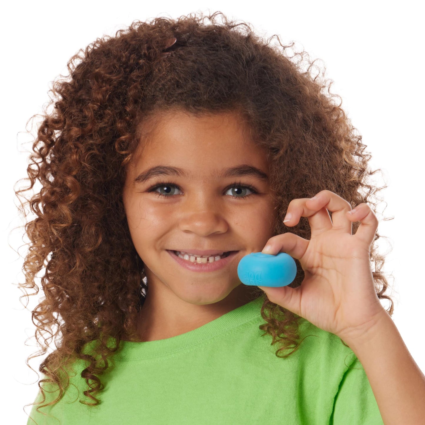 Girl holding blue Nee Doh Teenie Rainbow squishy