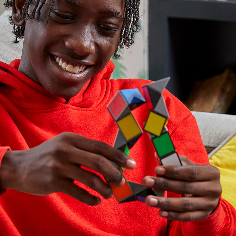 Guy solving Rubiks Twist Puzzle