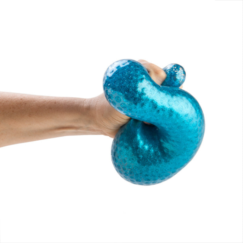Smoosho Jumbo Glitter Ball blue being squeezed
