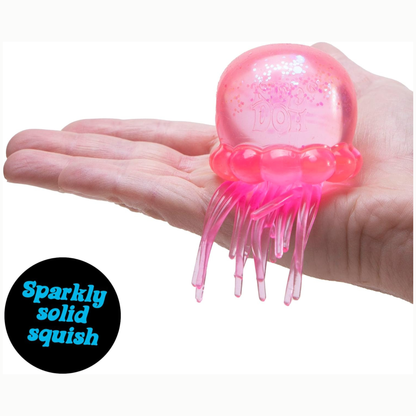 Schylling Nee Doh Jelly Squish pink in hand