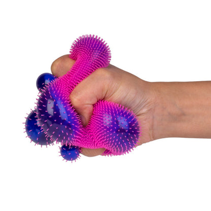 JX-SM_CCF Smoosho Furry Colour change ball pink being squeezed