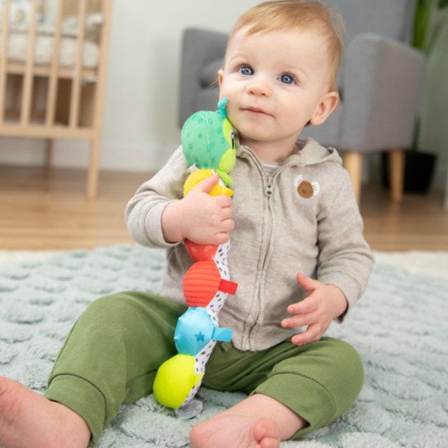 Boy with Lamaze Fidget Caterpillar