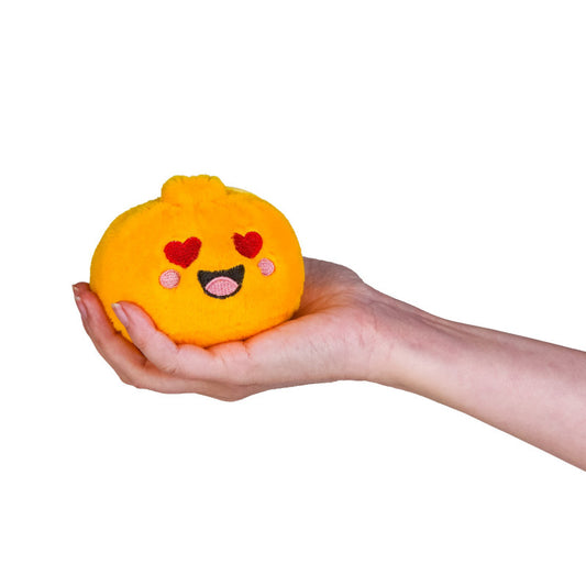 Smooshos Mystery Dumpling Plush Keychain in hand