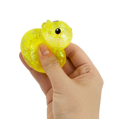 Shimmer Quackers Mystery Squishy Duck being squeezed