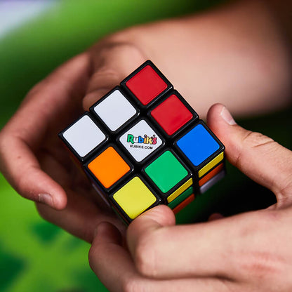 Original Rubiks Cube Fidget Puzzle in hands