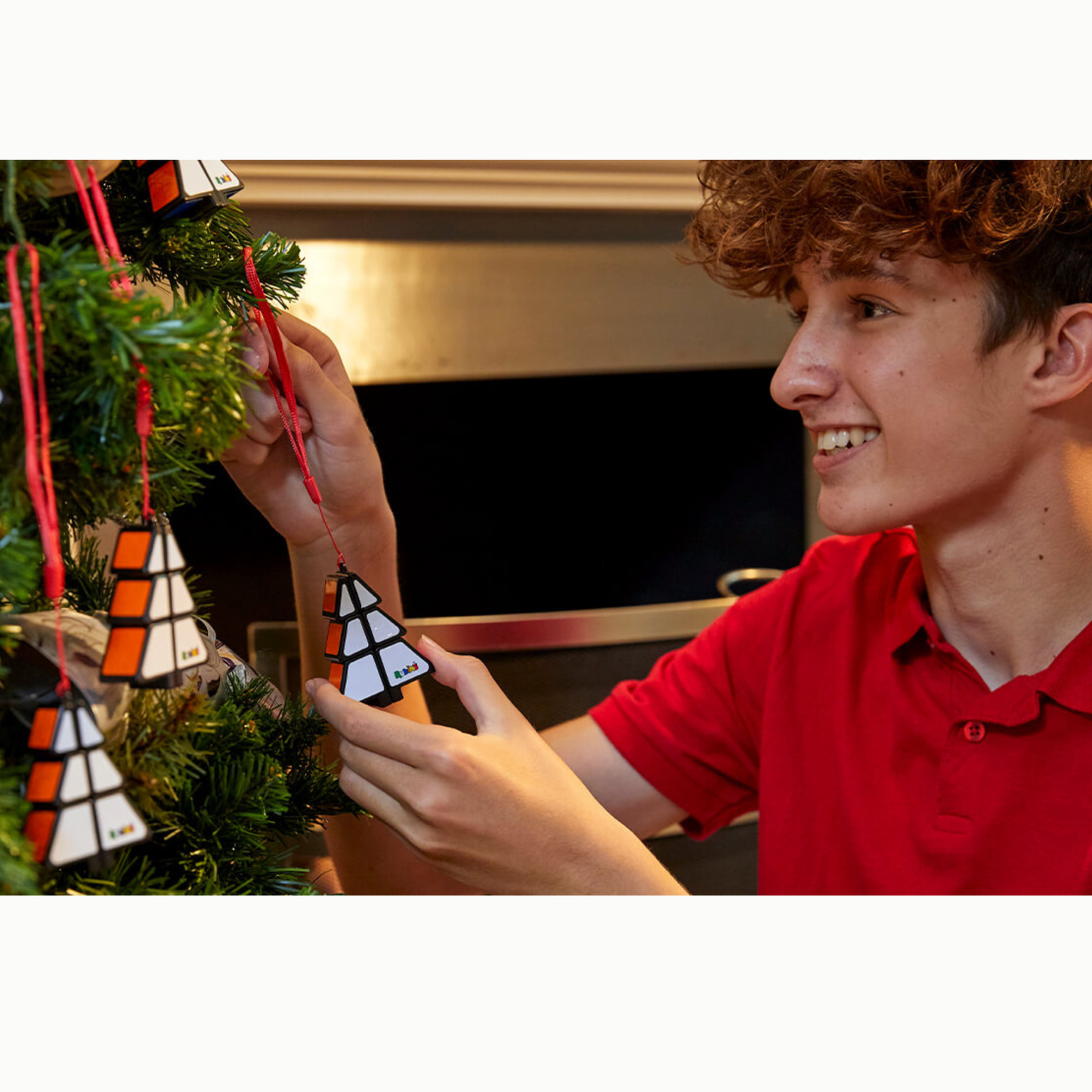 Boy hanging Rubiks Christmas Tree Fidget