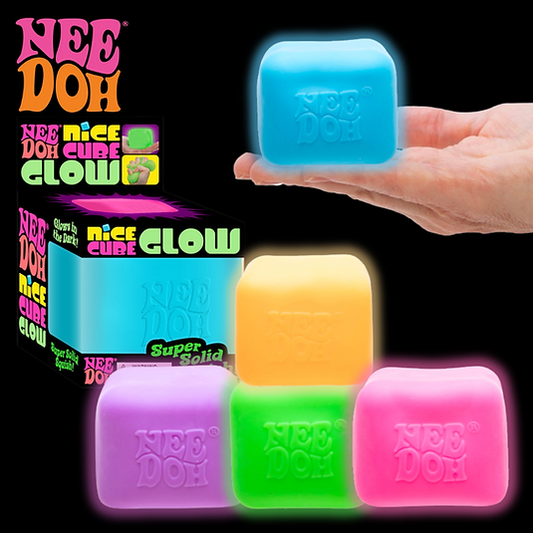 Glowing colorful Nee Doh blocks with packaging on a black background