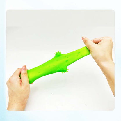Stretchy squishy sand cactus fidget being stretched.